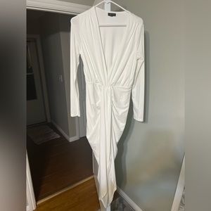 White long sleeve dress cinched in the middle